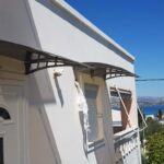 ​Στέγαστρο Εισόδου με Πολυκαρβονικό και Μεταλλικό Σκελετό Ηλεκτροστατικής Βαφής